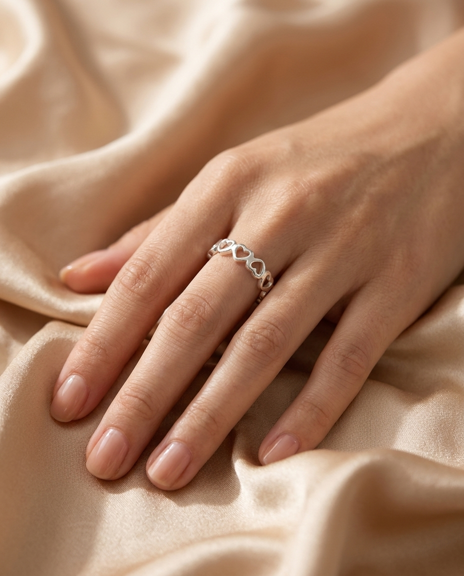 Open Hearts Ring worn on the hand